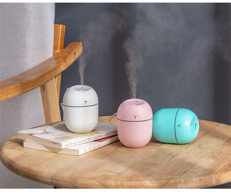 Mini Portable Ultrasonic Air Humidifier with LED Night Lamp and Aroma Diffuser Pink