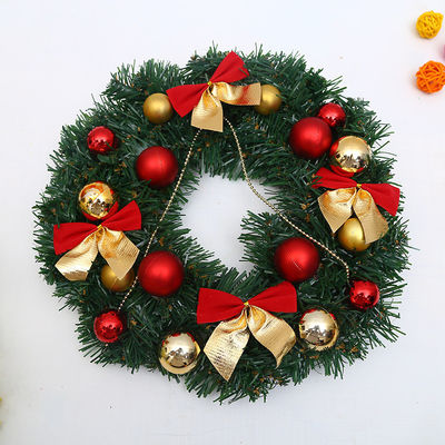 Bring Joy to Your Home with this Merry Christmas Wreath of Red Berries and Pine Cones